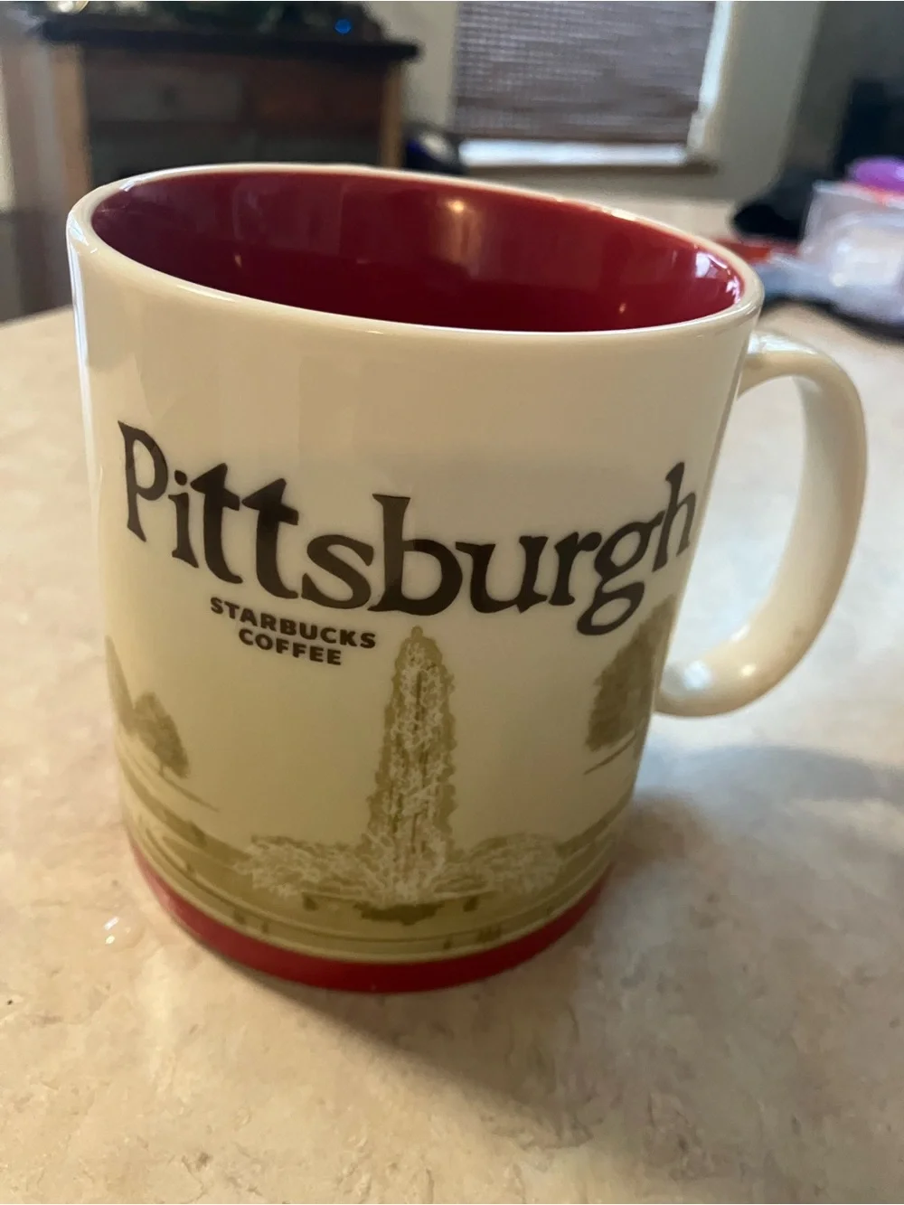Starbucks White Mug with Green Interior and Green Alaska Lettering